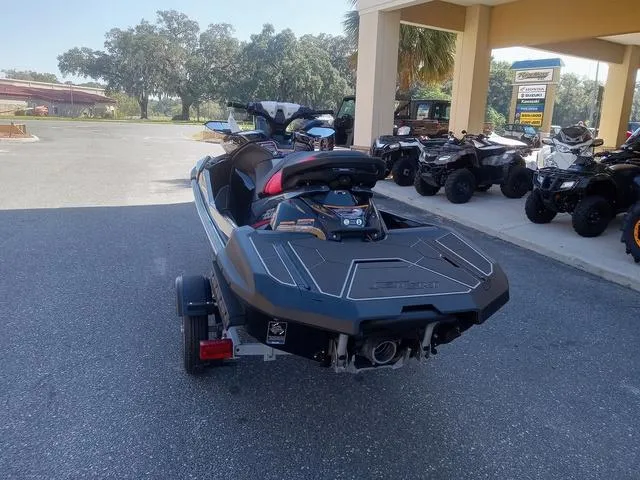 Slide: The Image of 2025 Kawasaki Waverunner Ultra 160LX-S on trailer, parked outdoors near dealership. - 15