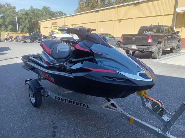 Slide: The Image of 2025 Kawasaki Waverunner Ultra 160LX-S on trailer in parking lot. - 6