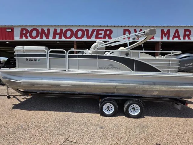 Slide: The Image of 2013 Bennington 2275GLW pontoon boat on trailer at Ron Hoover dealership. - 1