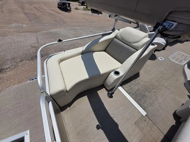 Slide: The Image of 2013 Bennington 2275GLW pontoon boat with outboard motor and beige seating. - 13