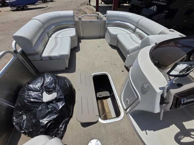 Slide: The Image of 2013 Bennington 2275GLW boat safety warnings and capacity labels on aluminum surface. - 19