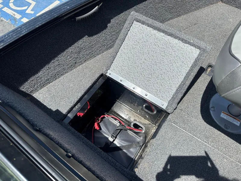 Slide: The Image of Open storage compartment in 2022 Lund 1650 Rebel XL Sport boat. - 26