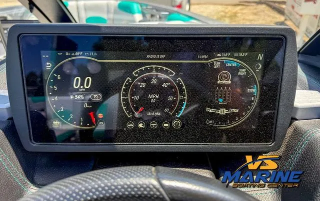Slide: The Image of Dashboard of a 2020 Malibu 25 LSV boat with digital display and controls. - 7