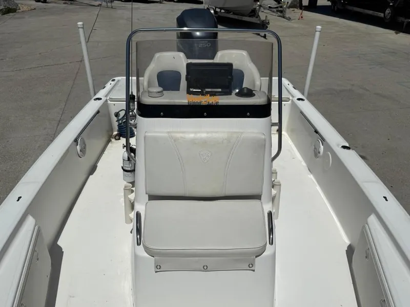 Slide: The Image of 2007 Century 2202 BAY boat interior with seating and console. - 12