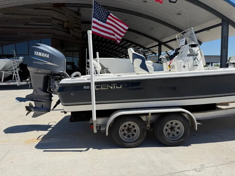 Slide: The Image of 2007 Century 2202 BAY boat on trailer with Yamaha engine and American flag. - 4
