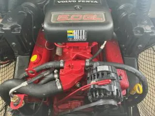 Slide: The Image of 2004 Glastron GS 205 boat engine, featuring a Volvo Penta 5.0GL motor. - 3