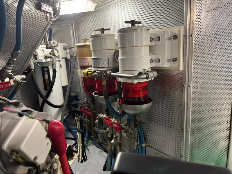 Slide: The Image of Engine room of 2003 Nordhavn N46 yacht with fuel filtration system and mechanical components. - 36
