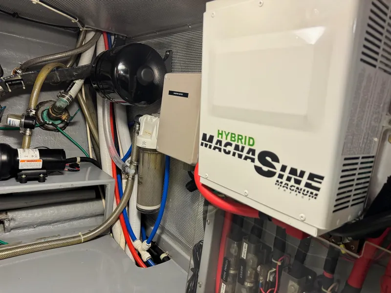 Slide: The Image of Engine room of a 2003 Nordhavn N46 with Hybrid MagnaSine inverter system. - 39