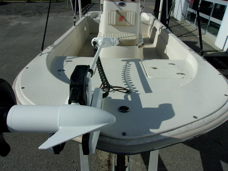 Slide: The Image of 2019 Carolina Skiff 18 JVX CC boat interior with trolling motor and seating. - 10