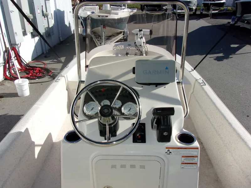 Slide: The Image of 2019 Carolina Skiff 18 JVX CC boat dashboard with Garmin navigation system. - 19