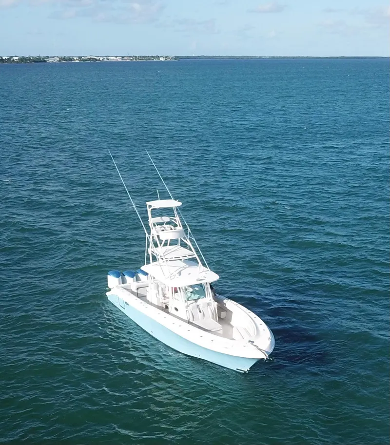 Slide: The Image of 2014 Hydra-Sports 42 boat on open ocean under clear sky. - 29