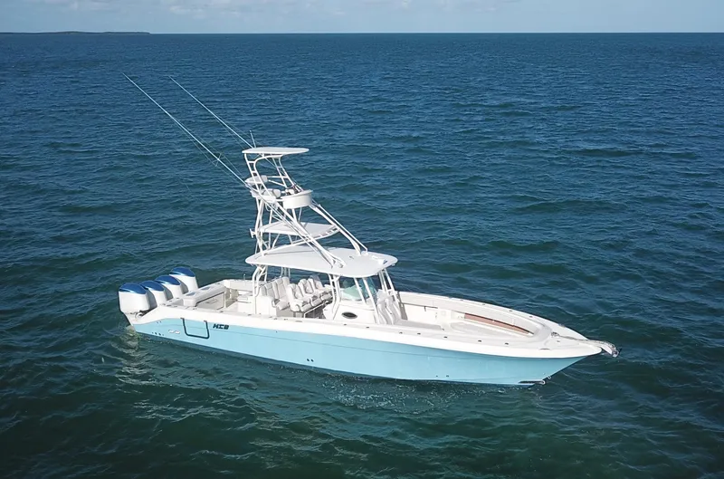 Slide: The Image of 2014 Hydra-Sports 42 boat cruising on open ocean waters. - 9