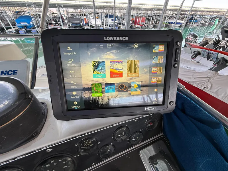 Slide: The Image of Lowrance HDS-12 display on 1992 Carver Command Bridge 2828 boat dashboard. - 25