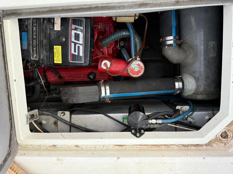 Slide: The Image of Engine compartment of a 1992 Carver Command Bridge 2828 with Volvo Penta components. - 28