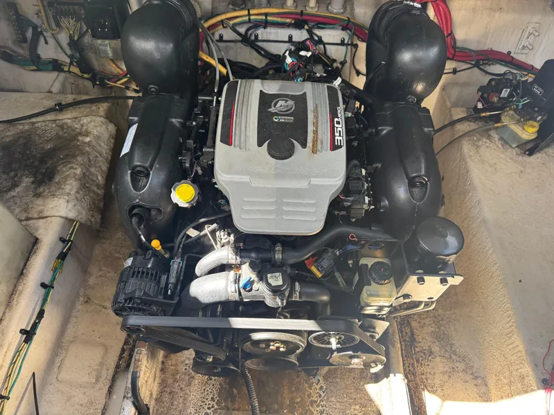 Slide: The Image of Engine compartment of a 2011 Bayliner 285 Cruiser, featuring a MerCruiser 350 MAG engine. - 17