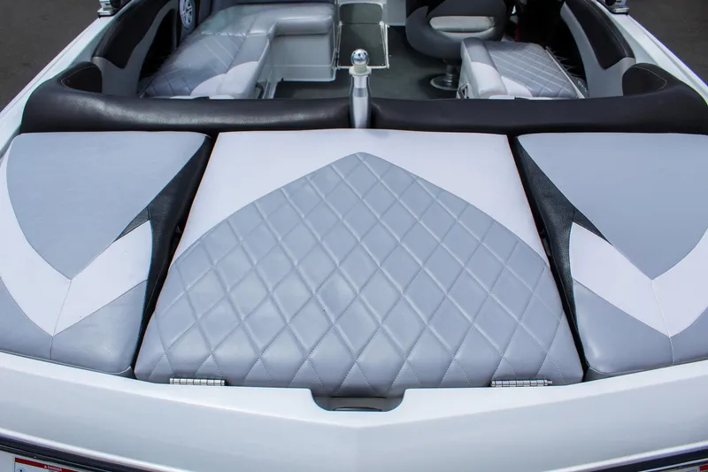 Slide: The Image of 2010 MasterCraft X-15 boat interior with diamond-stitched upholstery and sleek design. - 30