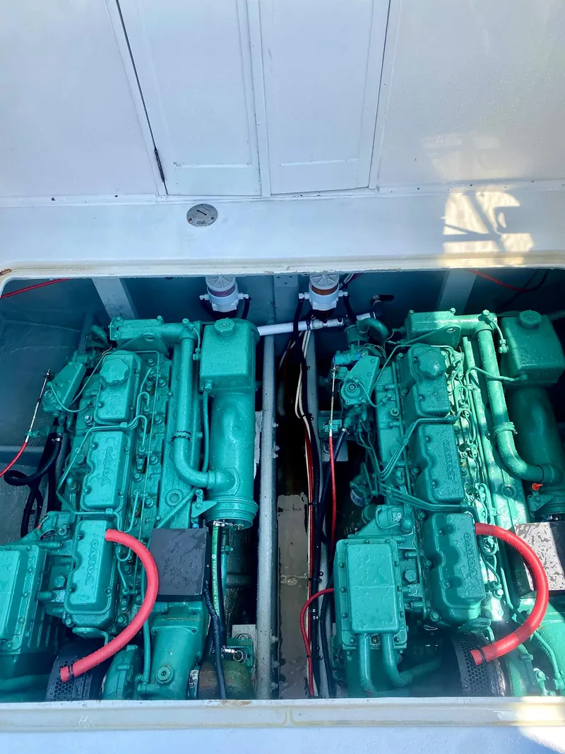 Slide: The Image of Twin green engines in a 1978 Topaz 28 boat, viewed from above. - 25
