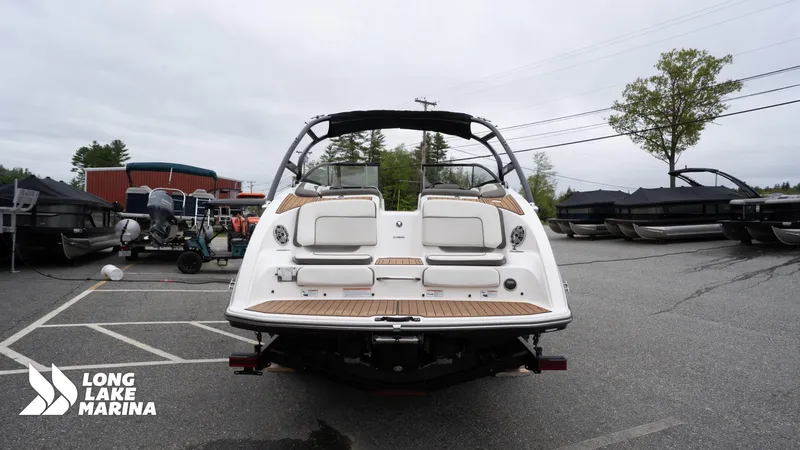 Slide: The Image of 2014 Yamaha Boats 242 Limited S at Long Lake Marina, rear view in parking lot. - 7