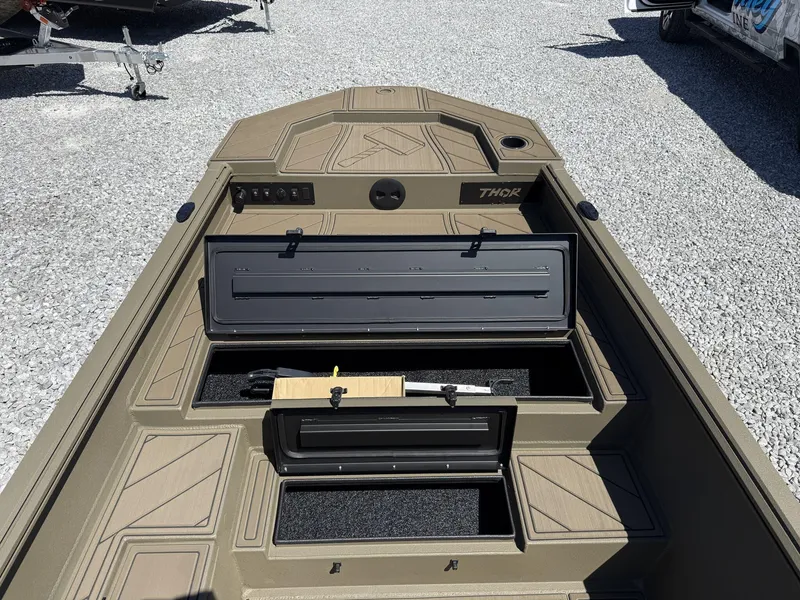 Slide: The Image of 2025 Thor Lake Hammer 1754 Timber Hammer boat with open storage compartments. - 4