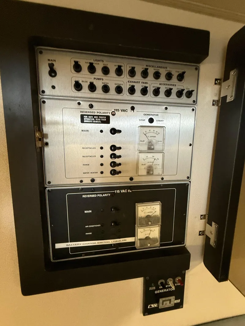 Slide: The Image of Electrical control panel in a 1988 Carver Montego 3257 boat. - 42