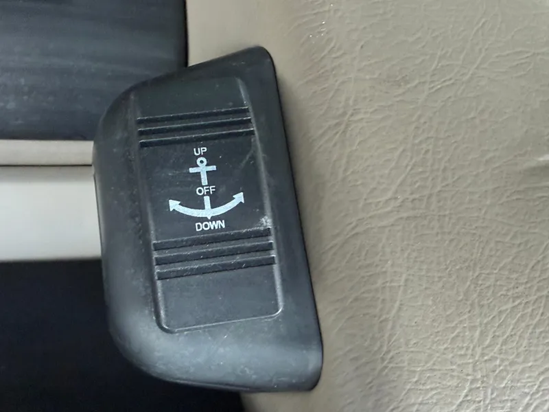 Slide: The Image of Switch panel on 2019 Bennington SX 25 Premium Swingback with up, off, down options. - 14