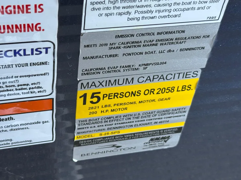 Slide: The Image of 2019 Bennington SX 25 Premium Swingback capacity label, 15 persons or 2058 lbs, 200 HP motor. - 17