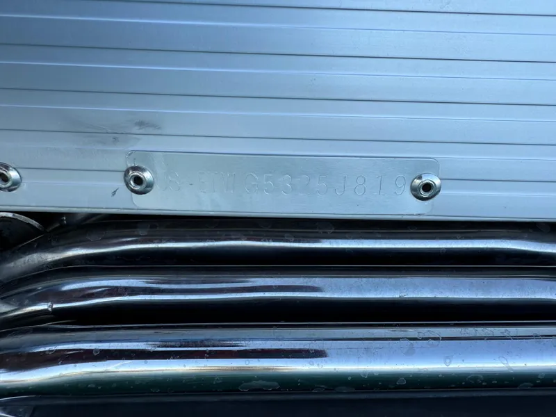 Slide: The Image of 2019 Bennington SX 25 Premium Swingback boat hull identification number plate. - 23