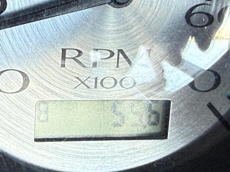 Slide: The Image of Close-up of RPM gauge on 2019 Bennington SX 25 Premium Swingback boat. - 5