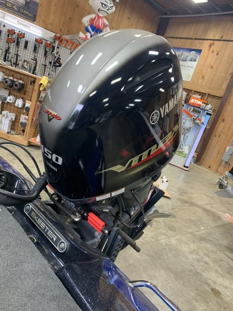 Slide: The Image of 2020 Skeeter ZX190 with Yamaha VMAX 150 outboard motor in a showroom. - 7