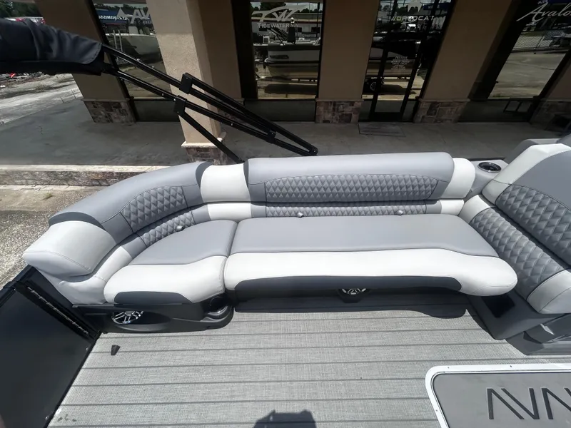 Slide: The Image of Luxurious seating on 2025 Avalon CAT VRB25T boat, featuring elegant gray upholstery. - 12