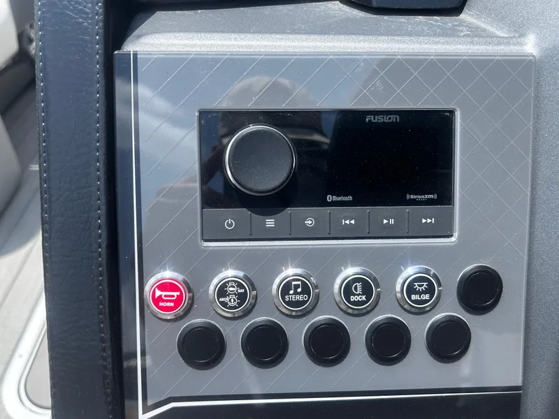 Slide: The Image of Control panel of Avalon CAT VRB25T 2025 with buttons for horn, stereo, dock, and bilge. - 22