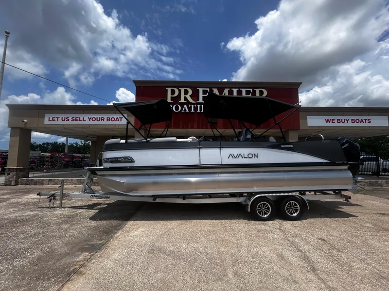 Slide: The Image of 2025 Avalon CAT VRB25T pontoon boat on trailer at Premier Boating dealership. - 35