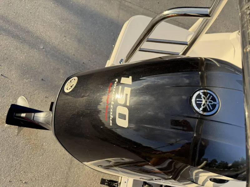 Slide: The Image of Yamaha 150 horsepower outboard motor on a 2022 Hurricane SS205 boat. - 14