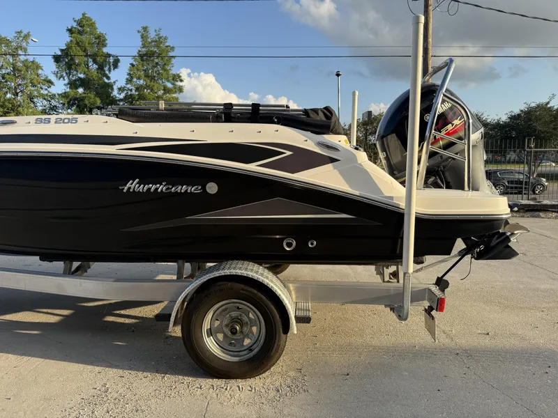 Slide: The Image of 2022 Hurricane SS205 boat on trailer, side view, with Yamaha outboard motor. - 5