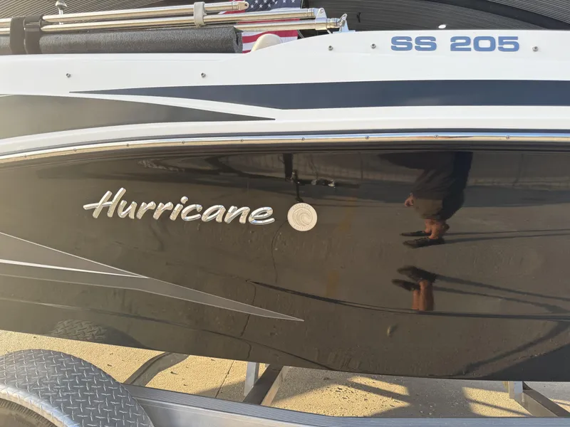 Slide: The Image of 2022 Hurricane SS205 boat side view with logo and trailer. - 6
