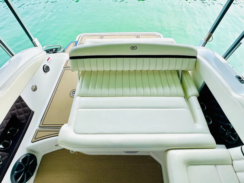 Slide: The Image of Luxurious seating on a 2012 Cobalt A28 boat with elegant white upholstery. - 25