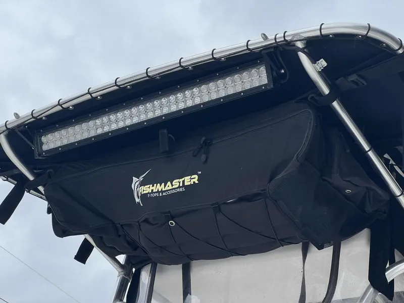 Slide: The Image of 2005 ProKat Bay Kat boat with Fishmaster T-top and LED light bar. - 12