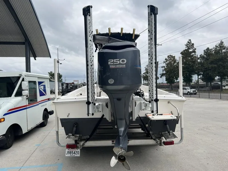 Slide: The Image of 2005 ProKat Bay Kat boat with 250 horsepower engine on trailer. - 3