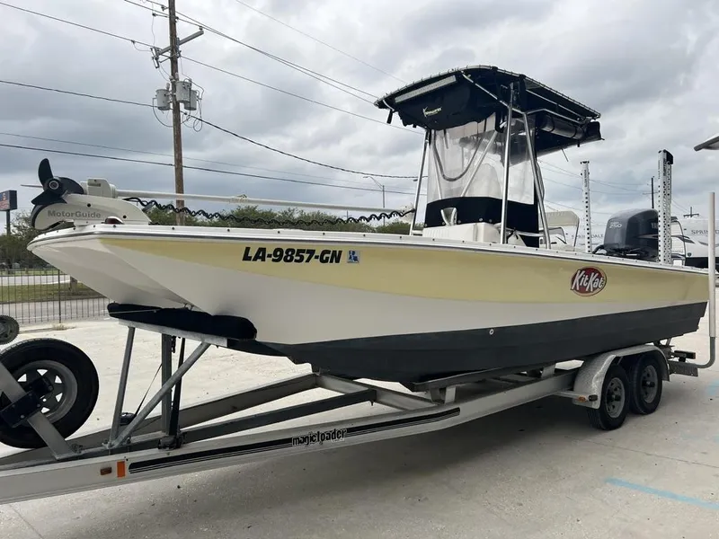 Slide: The Image of 2005 ProKat Bay Kat boat on trailer, featuring a MotorGuide trolling motor. - 6
