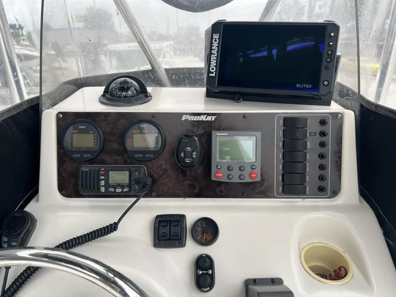 Slide: The Image of 2005 ProKat Bay Kat boat dashboard with Lowrance Elite GPS and Yamaha gauges. - 9