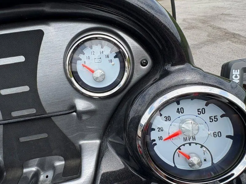 Slide: The Image of Dashboard of 2019 Tracker Pro Team 175 boat with speedometer and fuel gauge. - 21