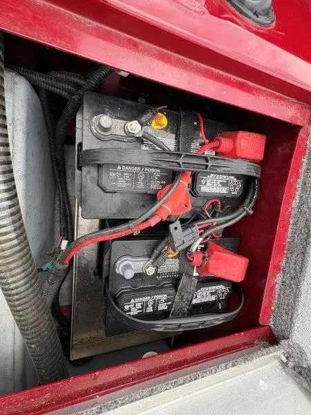 Slide: The Image of Batteries in a 2019 Tracker Pro Team 175 boat, showing wiring and connections. - 23