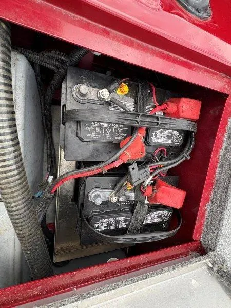 Slide: The Image of Batteries in a 2019 Tracker Pro Team 175 boat, showing wiring and connections. - 24