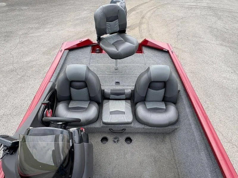 Slide: The Image of 2019 Tracker Pro Team 175 boat interior with gray seating and red accents. - 26