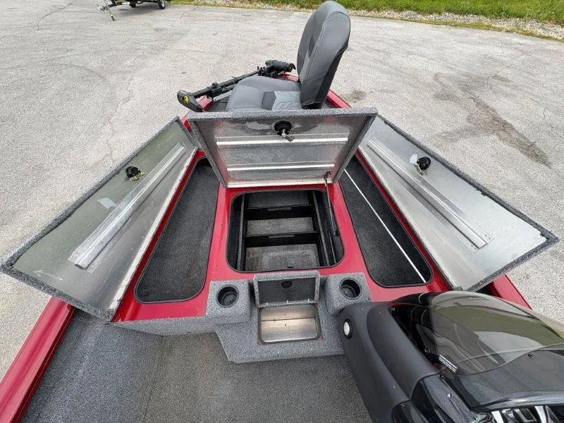 Slide: The Image of 2019 Tracker Pro Team 175 boat with open storage compartments and seating. - 34