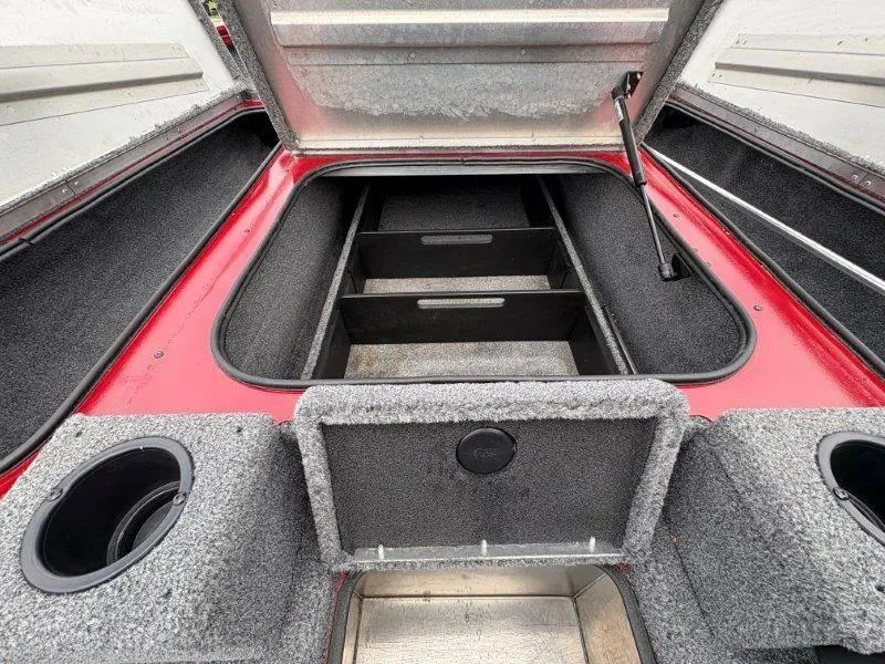 Slide: The Image of 2019 Tracker Pro Team 175 boat storage compartments, open and spacious interior view. - 41