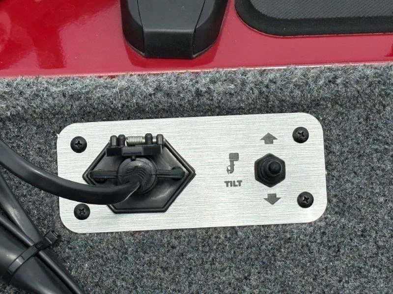 Slide: The Image of Tilt control panel on 2019 Tracker Pro Team 175 boat, featuring directional arrows. - 45