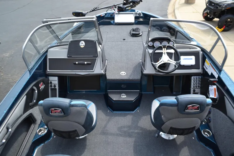 Slide: The Image of 2025 Ranger 1880MS boat interior with dual consoles and modern steering wheel. - 3