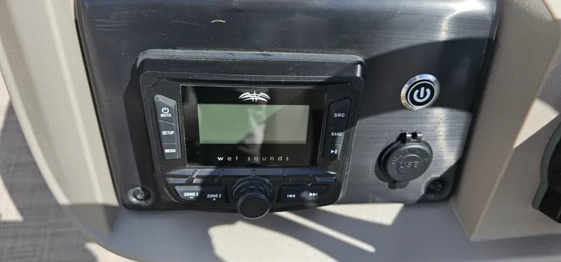 Slide: The Image of Control panel of 2025 Sun Tracker Party Barge 20 DLX with Wet Sounds audio system. - 11