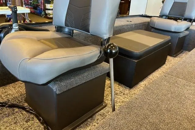 Slide: The Image of 2025 Tracker Panfish 17 boat interior with cushioned seats and carpeted flooring. - 4